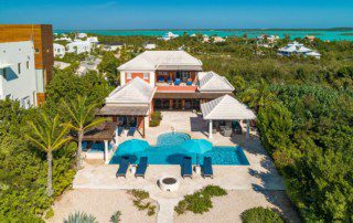 A photo from above of Villa La Percha on Taylor Bay Beach.